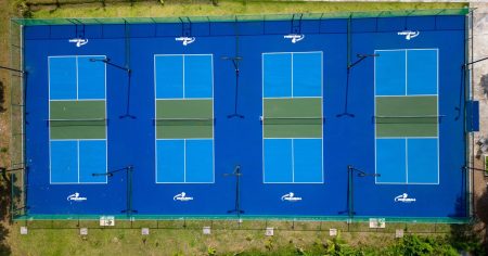 What Are Pickleball Court Surfaces Made Of? Concrete pickleball court surface with acrylic covering