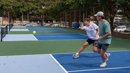 Hank Huthnance (l) and Boyd Driggers on the new Turner Center courts - image courtesy of Srijita Chattopadhyay - Ole Miss Digital Imaging Services