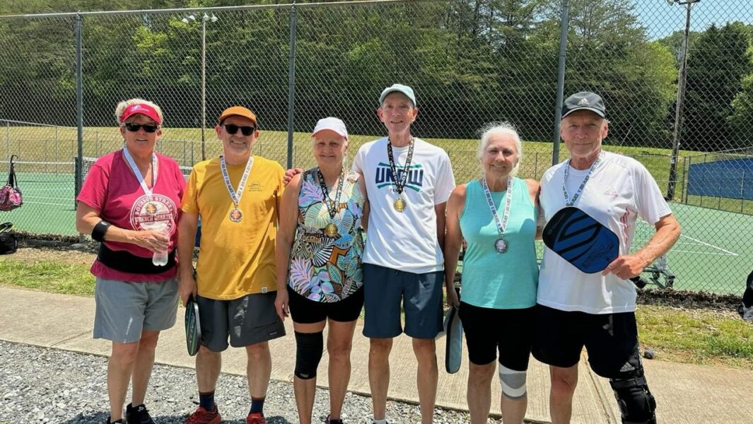 The winners of the mixed-doubles bracket in the May Mars Hill tournament - image courtesy of Neighbors In Need